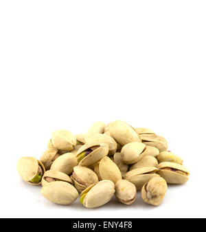 pistachios in a glass plate, isolated on white background Stock Photo