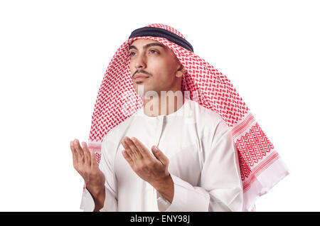 Arab man praying on white Stock Photo