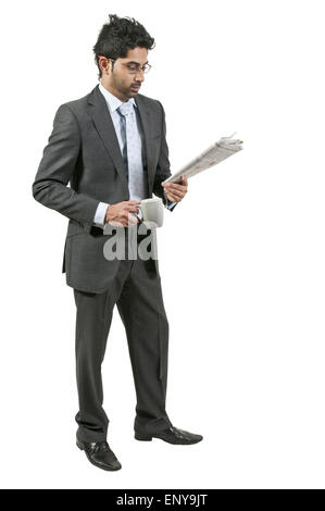 Man Drinking Coffee with Newspaper Stock Photo