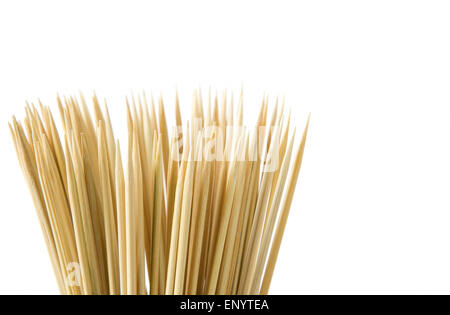 Bunch of wooden skewers on a white background Stock Photo