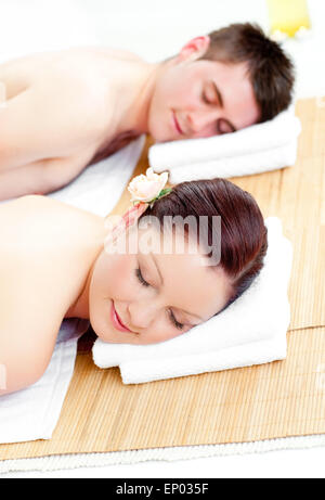 Resting caucasian couple lying on a massage table Stock Photo
