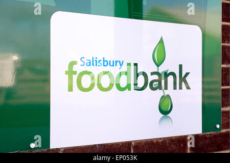 Charity food bank sign in Salisbury UK. Green text on white background Stock Photo