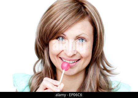 Attractive woman holding a lollipop Stock Photo