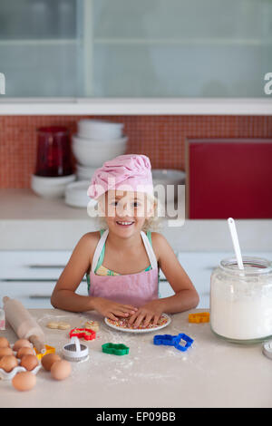 Little blond girl smiling at camera Stock Photo