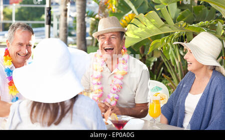 Friends drinking  together under the sun Stock Photo