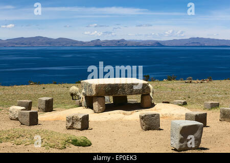 Sheep grazing around the Ceremonial Table on Isla del Sol (Island of the Sun) in Lake Titicaca, Bolivia Stock Photo
