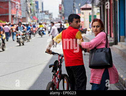 Kathmandu, Nepal. 10th May, 2015. Nepalese people race into the streets in panic during a 7.3 magnitude aftershock in the earthquake devastated kingdom May 12, 2015 in Kathmandu, Nepal. Stock Photo