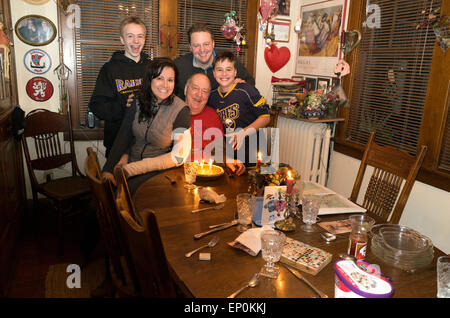 Infamous photographer Steve Skjold celebrating his 76th birthday surrounded by his loving family. St Paul Minnesota MN USA Stock Photo
