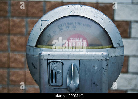 Vintage parking meter with red expired sign. Stock Photo