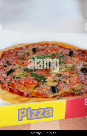 pizza with an appetizing stuffing in the delivery box Stock Photo