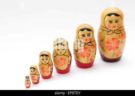 Russian doll, refers to a set of wooden dolls of decreasing size placed one inside the other. Stock Photo