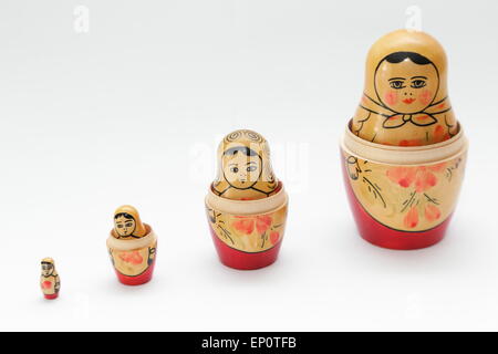 Russian doll, refers to a set of wooden dolls of decreasing size placed one inside the other. Stock Photo