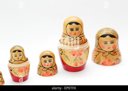 Russian doll, refers to a set of wooden dolls of decreasing size placed one inside the other. Stock Photo