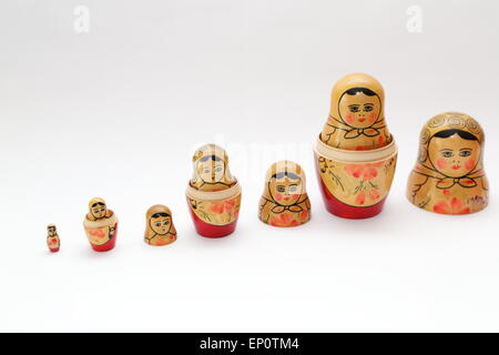 Russian doll, refers to a set of wooden dolls of decreasing size placed one inside the other. Stock Photo