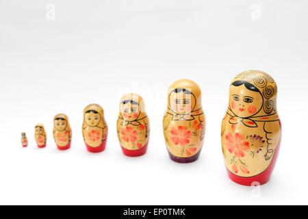 Russian doll, refers to a set of wooden dolls of decreasing size placed one inside the other. Stock Photo