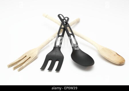 Various kitchen utensils on white background.