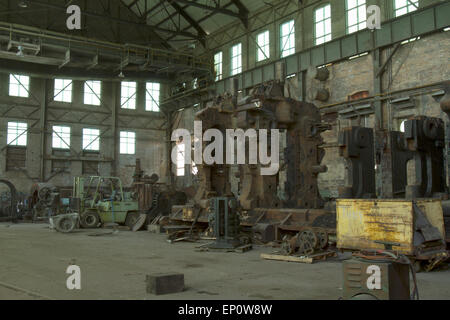 Machinery shed of abandoned steel mill. Stock Photo