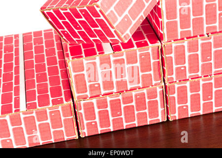 Cardboard brick column graph showing steady growth Stock Photo