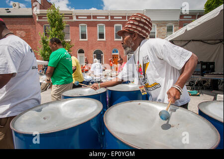 African American performing on steel drums in Baltimore, Maryland, USA