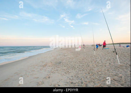 Families fishing at Assateague Island National Seashore, Maryland, USA Stock Photo