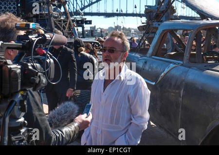 Sydney, Australia. 13th May, 2015. Mad Max Fury Road came to Sydney for the movie premiere and put on a promotional event  at Circular quay, production designer Colin Gibson talks to the media about the film Stock Photo