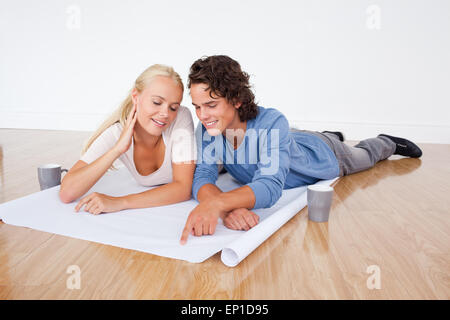 Young couple looking at a plan Stock Photo
