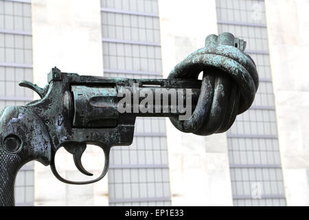 Carl Fredrik Reutersward (b. 1934). Swedish painter and sculptor. Sculpture Non-Violence. Bronze. Revolver with knotted barrel. Stock Photo