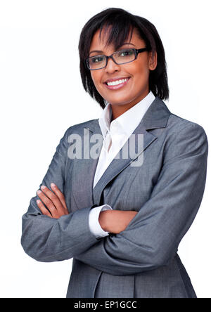Businesswoman with folded arms wearing glasses against a white background Stock Photo