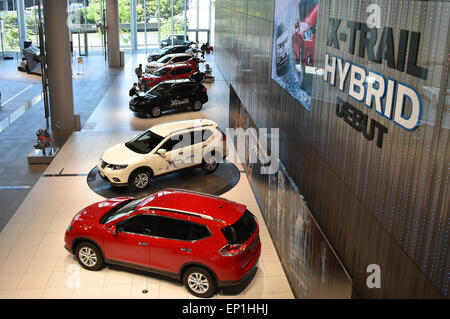 Yokohama, Japan. 13th May, 2015. Japans Nissan Motor forecasts net income of 485 billion yen in the current year ending March 31, 2016, from 457.6 billion yen a year earlier. Credit:  Natsuki Sakai/AFLO/Alamy Live News Stock Photo