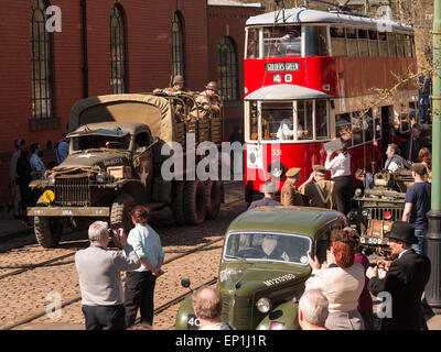 World war two enthusiasts reenact the era in period costumes and uniforms, at The National Tramway Museum,Crich,derbyshire,UK.taken 06/04/2015 Stock Photo