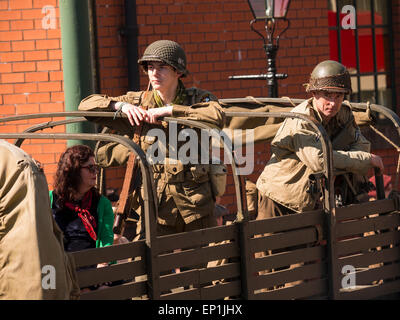 World war two enthusiasts reenact the era in period costumes and uniforms, at The National Tramway Museum,Crich,derbyshire,UK.taken 06/04/2015 Stock Photo