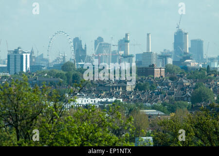 Wimbledon London,UK.13th May 2015. A panoramic view of London  skyline towards the Millennium Wheel, Battersea Power Station and Houses of PArliament in the distance on a warm spring day in the capital Credit:  amer ghazzal/Alamy Live News Stock Photo