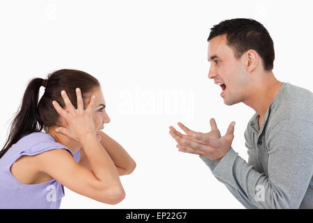 Young couple yelling at each other Stock Photo