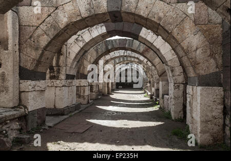 Empty corridor with arcs and columns. Ruins of Ancient city Smyrna. Izmir, Turkey Stock Photo