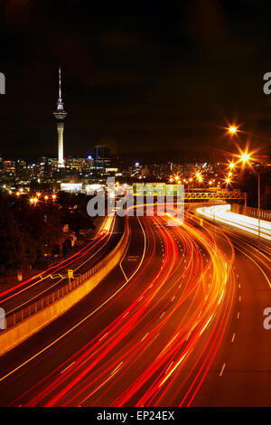 Northern Motorway and Skytower at night, Auckland, North Island, New Zealand Stock Photo