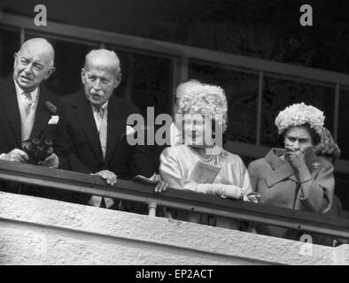 Her Majesty Queen Elizabeth II watches the horseracing from the Royal Box during the Epsom Derby. 31st May 1961. Stock Photo