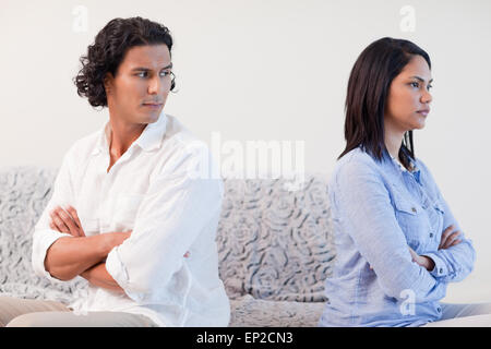 Couple having a fight in the living room Stock Photo