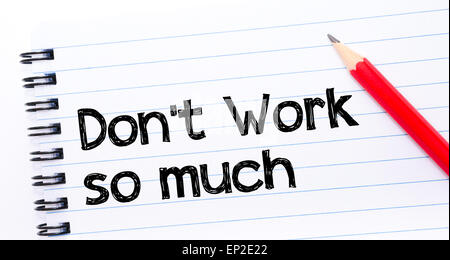Do Not Work So Much Text written on notebook page, red pencil on the right. Motivational Concept image Stock Photo