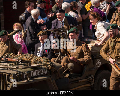 World war two enthusiasts reenact the era in period costumes and uniforms, at The National Tramway Museum,Crich,derbyshire,UK.taken 06/04/2015 Stock Photo