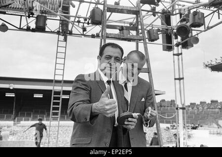 Angelo Dundee (left) manager of World Heavyweight Champion Cassius Clay seen here during a visit to Highbury along with the secretary of the BBBC Mr Teddy Waltham . The pair were there to oversee the preparations for the bout between Clay and Henry Cooper 20th May 1966 Stock Photo