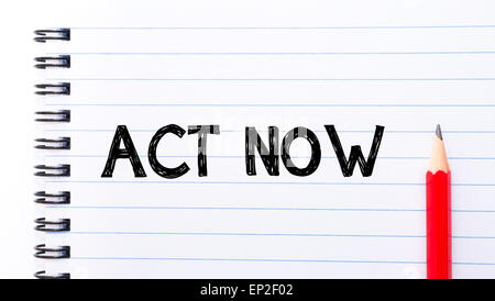 Act Now Text written on notebook page, red pencil on the right. Motivational Concept image Stock Photo