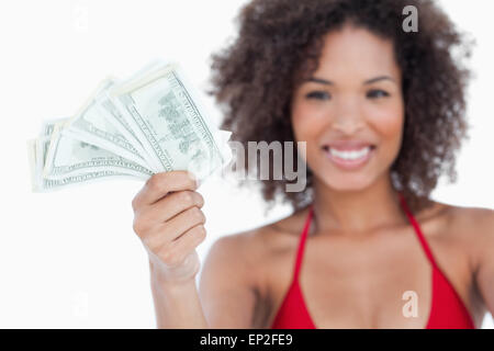 Bank notes being held by an attractive woman Stock Photo