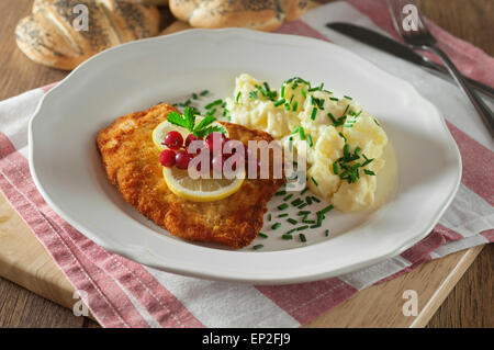Schnitzel and potato salad Stock Photo