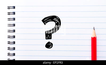 Question MarkText written on notebook page, red pencil on the right. Concept image Stock Photo