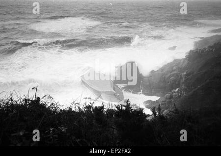 Penlee Life Boat Disaster pictures taken 20th December 1981. The Penlee life boat was launched from the Cornish village of Mousehole at exactly 20:12 on Saturday night (19th) after the freighter Union Star sent out distress call. At 21:22 coxswain Trevelyan Richards radioed that he had managed to get four people aboard. Then there was silence. All hope has now been abandoned for the lifeboatmen and the eight people from the freighter. The Union Star on its maiden voyage lays capsized and shattered at the foot of cliffs at Tater Du just along the coast from Mousehole. Stock Photo