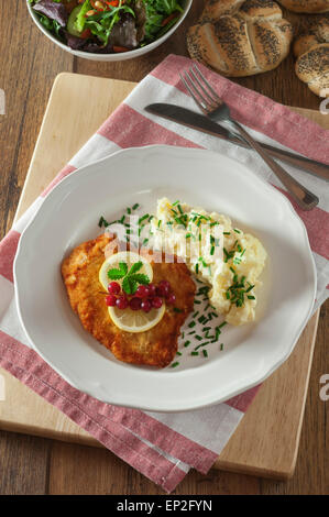 Schnitzel and potato salad Stock Photo
