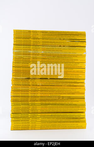 Stack of National Geographic magazines against a white background Stock Photo