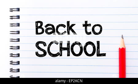 Back to School Text written on notebook page, red pencil on the right. Motivational Concept image Stock Photo
