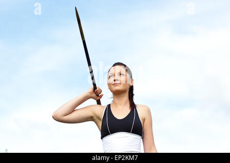 Female athlete throwing the javelin Stock Photo