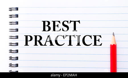Best Practice Text written on notebook page, red pencil on the right. Concept image Stock Photo
